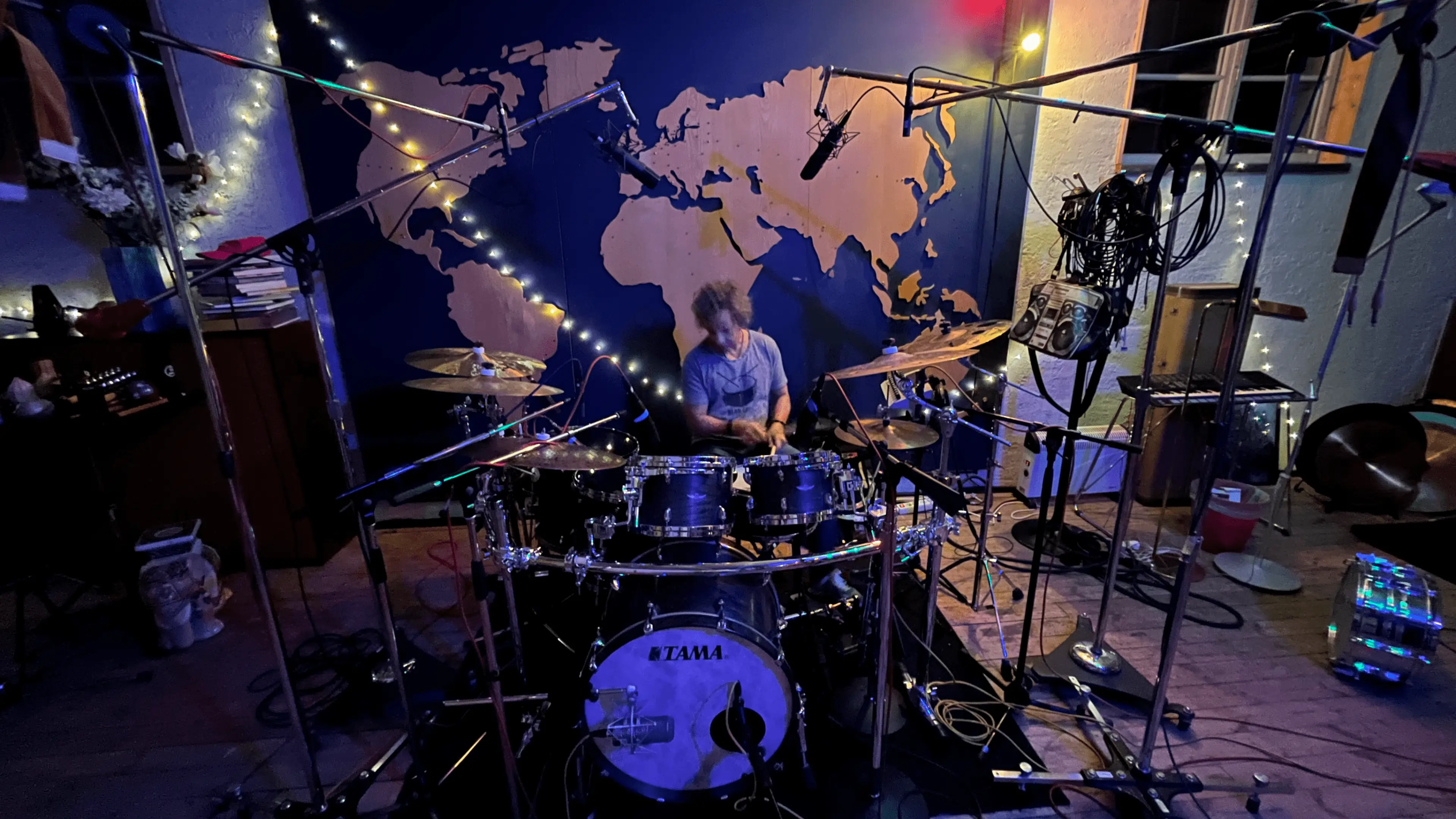 Nicka playing drums in the studio